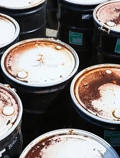 NWE Waste Services Ltd providing licensed hazardous waste collection and disposal services across Manchester and the North West (2025).